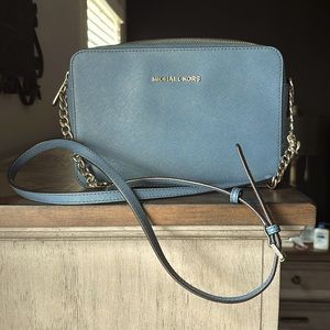 Michael Kors bag, small stain on inside liner, otherwise great condition.